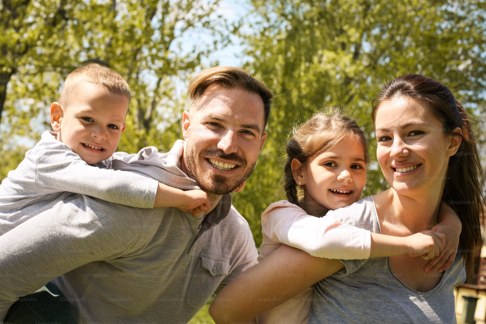A family together, representing the people a life insurance plan may help protect